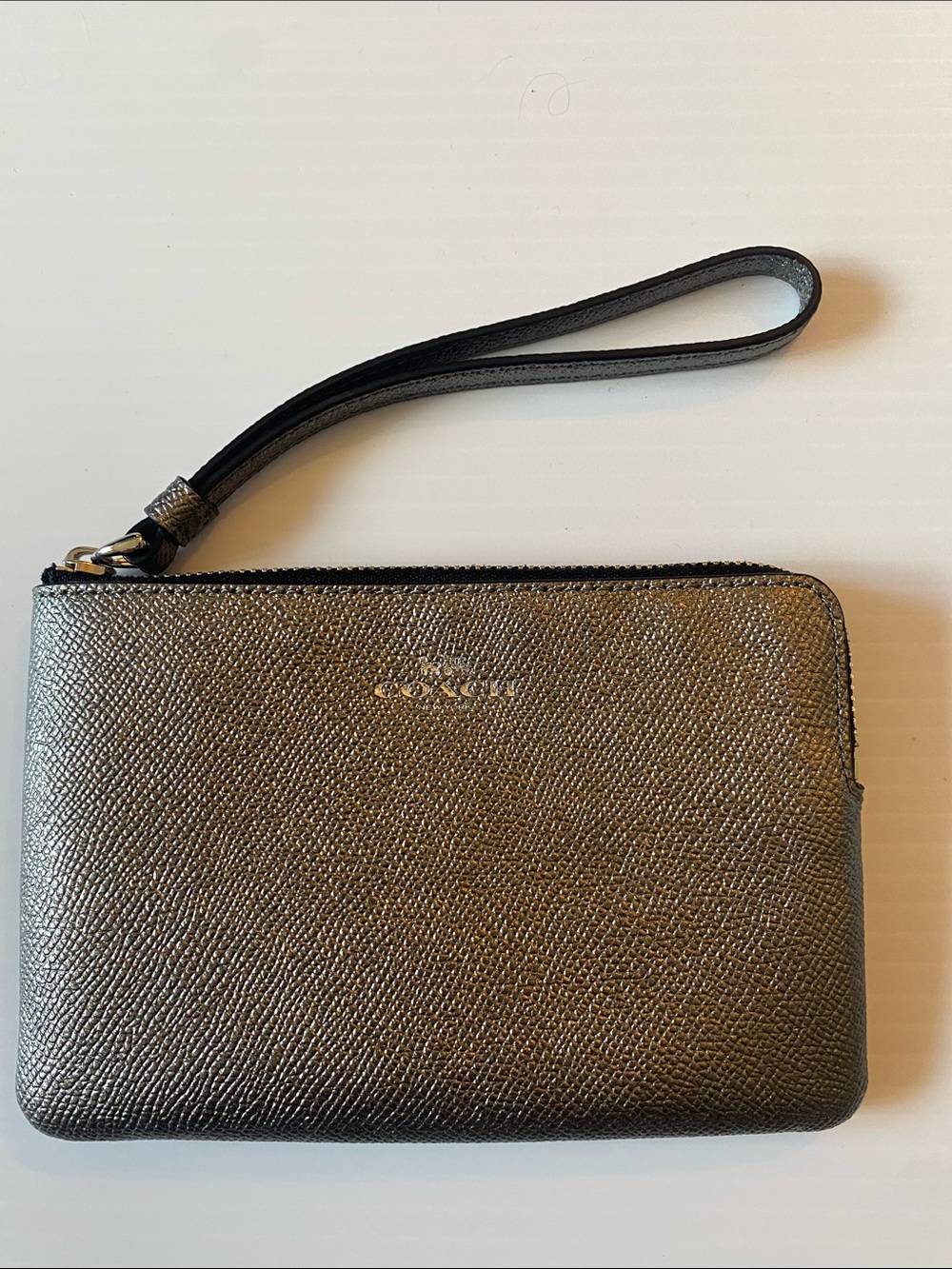Coach Corner Zip Leather Wristlet in Silver and Black. F21070